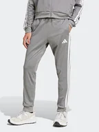 Spodnie sportowe męskie - adidas Spodnie dresowe w kolorze szarym - miniaturka - grafika 1