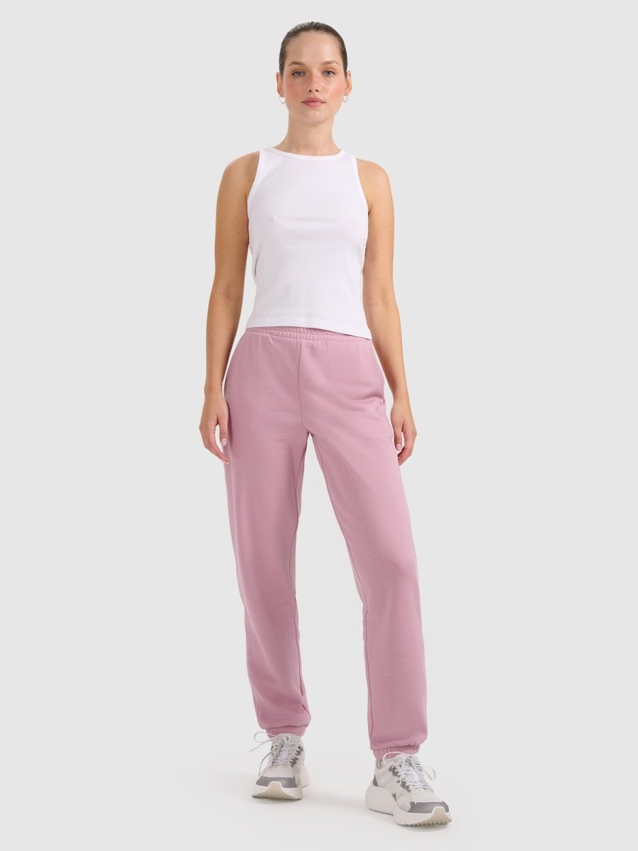 Spodnie dresowe joggery damskie 4F 4FRAW25TTROF1613-56S Różowy M