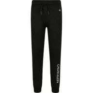 Spodnie i spodenki dla chłopców - CALVIN KLEIN JEANS Spodnie dresowe | Regular Fit - miniaturka - grafika 1