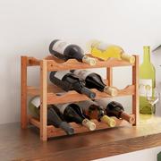 Pozostałe akcesoria barmańskie - vidaXL Stojak na 12 butelek wina, drewno orzecha włoskiego - miniaturka - grafika 1