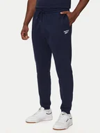 Spodnie sportowe męskie - Reebok Spodnie dresowe HH8325 Granatowy Regular Fit - miniaturka - grafika 1
