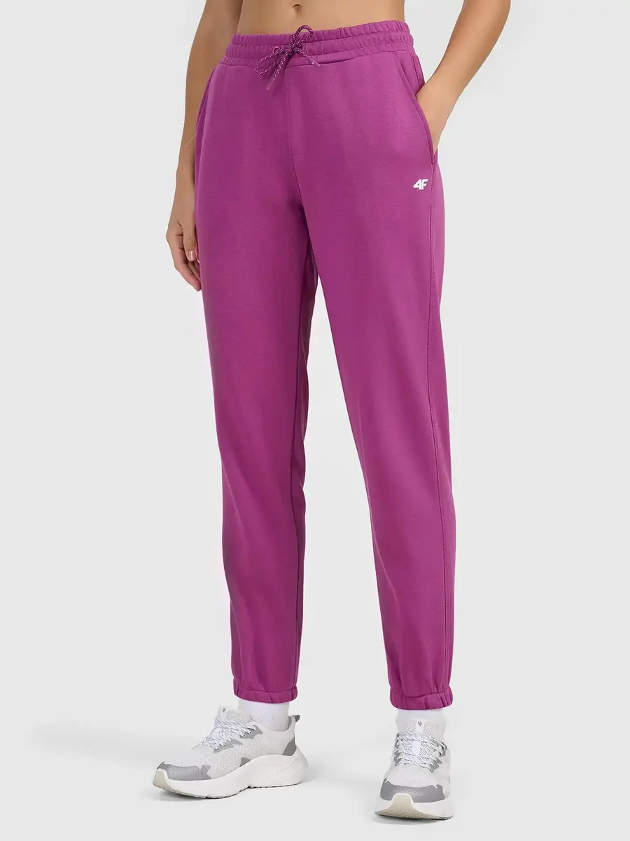 Spodnie dresowe typu jogger damskie 4F 4FWAW26TTROF1754-54S Różowy XS