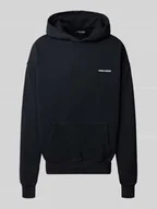 Bluzy męskie - Bluza o kroju oversized z kapturem, wyhaftowanym logo i kieszenią kangurką - miniaturka - grafika 1