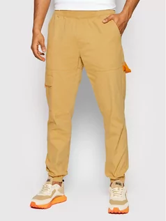 Spodnie męskie - Outhorn Spodnie materiałowe SPMC600 Żółty Regular Fit - grafika 1