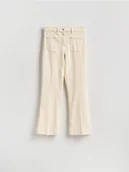 Spodnie damskie - Reserved - Jeansy flare - kremowy - miniaturka - grafika 1