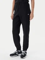 Spodnie sportowe damskie - Champion Spodnie dresowe 117872 Czarny Slim Fit - miniaturka - grafika 1