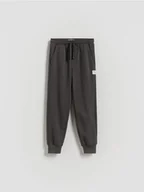 Spodnie i spodenki dla chłopców - Reserved - Bawełniane spodnie jogger - ciemnoszary - miniaturka - grafika 1