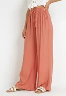 Spodnie damskie - Różowe Szerokie Spodnie z Wiskozy Zyona - miniaturka - grafika 1