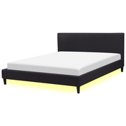 Łóżka - Beliani Łóżko czarne tapicerowane LED biały 180 x 200 cm FITOU - miniaturka - grafika 1