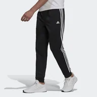 Spodnie sportowe męskie - Spodnie męskie adidas Primegreen Essentials Warm-Up Tapered 3-Stripes Track - miniaturka - grafika 1