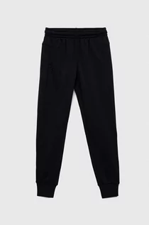 Spodnie i spodenki dla chłopców - Under Armour spodnie dresowe dziecięce kolor czarny gładkie - grafika 1
