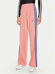 adidas Spodnie dresowe adicolor Classic Firebird JP2312 Różowy Loose Fit - Spodnie sportowe damskie - miniaturka - grafika 1