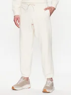 Spodnie sportowe męskie - New Balance Spodnie dresowe MP23551 Écru Relaxed Fit - miniaturka - grafika 1