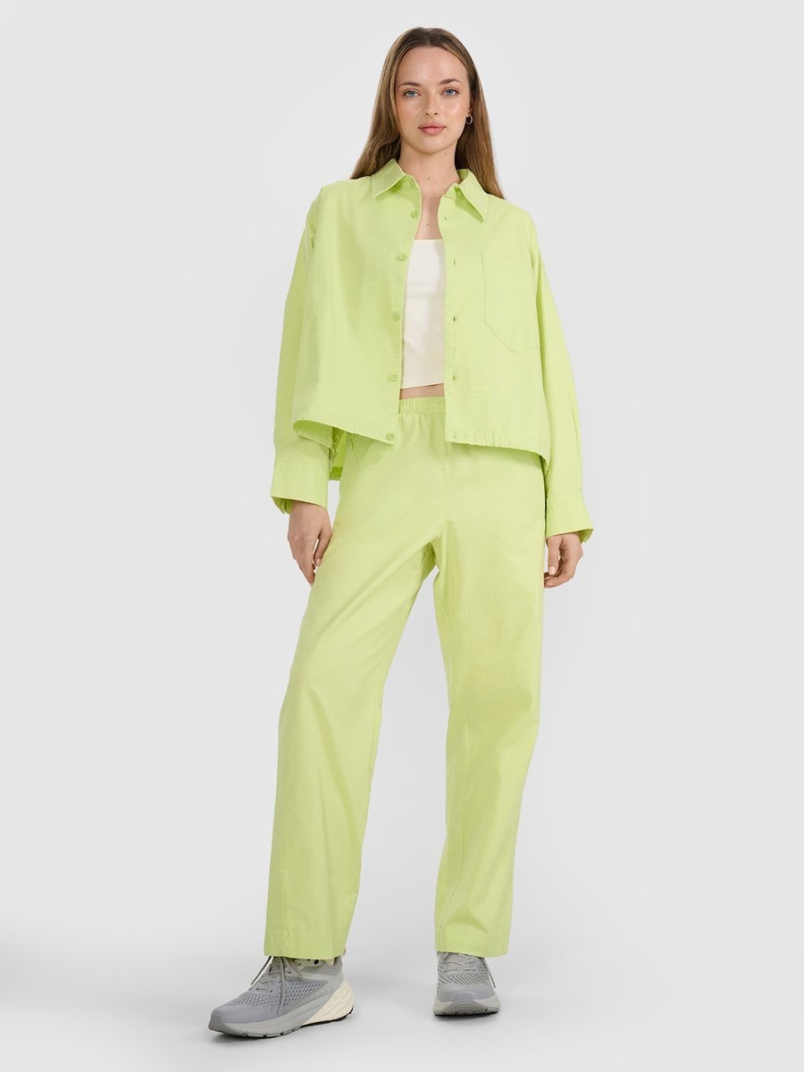 Damskie spodnie tkaninowe 4F 4FRSS25TTROF1448-73S Żółty Roz. M