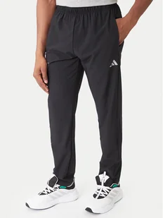 adidas Spodnie dresowe Training Essentials Holiday JM5441 Czarny Regular Fit - Spodnie sportowe męskie - miniaturka - grafika 1
