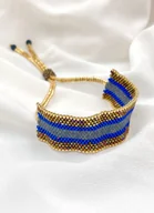 Bransoletki - Bransoletka koralikowa złota metaliczna regulowana - miniaturka - grafika 1