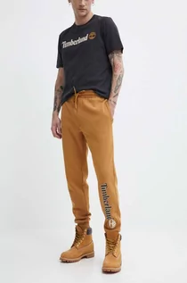 Spodnie męskie - Timberland spodnie dresowe kolor brązowy z nadrukiem TB0A5YFBP471 - grafika 1