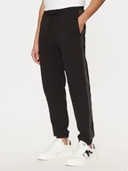 Spodnie sportowe męskie - Calvin Klein Jeans Spodnie dresowe J30J327243 Czarny Regular Fit - miniaturka - grafika 1