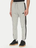 Spodnie sportowe męskie - adidas Spodnie dresowe Essentials 3-Stripes JE6318 Szary Regular Fit - miniaturka - grafika 1
