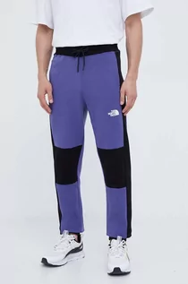 Spodnie męskie - The North Face spodnie dresowe bawełniane kolor fioletowy wzorzyste - grafika 1