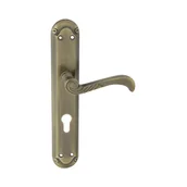 Klamki - Domino Klamka do drzwi wewnętrznych z długim szyldem do wkładki Casablanka 72 mm mosiądz/patyna - miniaturka - grafika 1