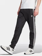 Spodnie sportowe męskie - Spodnie dresowe adidas - miniaturka - grafika 1