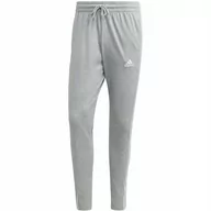 Dresy męskie - Spodnie męskie adidas Essentials Single Jersey Tapered Open Hem 3-Stripes s - miniaturka - grafika 1