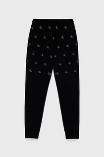 Spodnie damskie - Calvin Klein Jeans Jeans spodnie dziecięce kolor czarny wzorzyste - grafika 1