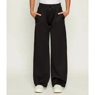 Spodnie i spodenki dla dziewczynek - Guess Spodnie dresowe Relaxed fit - miniaturka - grafika 1