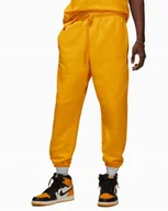 Dresy męskie - Spodnie dresowe Nike Air Jordan Wordmark Fleece żółte FJ0696-739 r. L - miniaturka - grafika 1