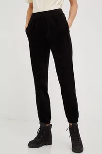 Spodnie damskie - Outhorn spodnie sztruksowe damskie kolor czarny high waist - grafika 1