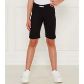 Spodnie i spodenki dla dziewczynek - Calvin Klein Jeans Kolarki | Slim Fit - miniaturka - grafika 1