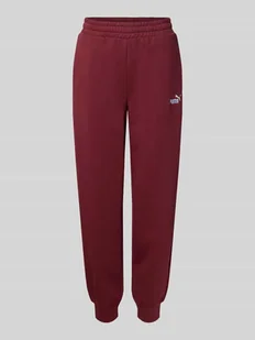 Spodnie dresowe o kroju slim fit z wyhaftowanym logo - Spodnie sportowe damskie - miniaturka - grafika 1