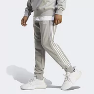 Spodnie sportowe damskie - Essentials French Terry Tapered Cuff 3-Stripes Pants - miniaturka - grafika 1