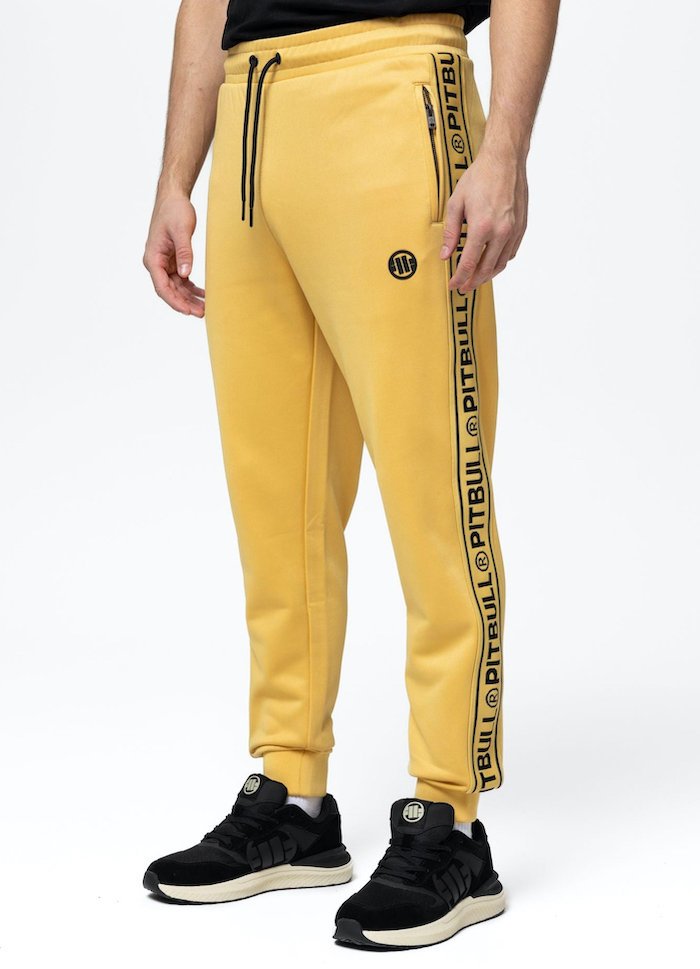 Spodnie dresowe PIT BULL OLDSCHOOL TAPE LOGO TERRY żółte (pale yellow)-XXL