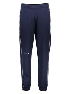Reebok Spodnie dresowe w kolorze granatowym - Spodnie sportowe damskie - miniaturka - grafika 1