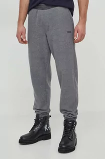Spodnie męskie - Calvin Klein spodnie dresowe kolor szary melanżowe - grafika 1