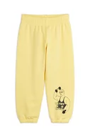 Spodnie i spodenki dla dziewczynek - Mini Rodini spodnie dresowe bawełniane dziecięce kolor żółty gładkie - miniaturka - grafika 1
