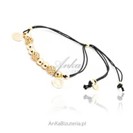 Bransoletki - ankabizuteria.pl Bransoletka srebrna pozłacana na czarnym sznureczku - miniaturka - grafika 1