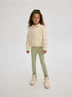 Spodnie i spodenki dla dziewczynek - Reserved - Jegginsy z rozcięciami - jasnozielony - miniaturka - grafika 1