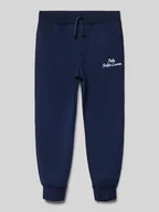 Spodnie i spodenki dla chłopców - Spodnie dresowe o kroju regular fit z wpuszczanymi kieszeniami - miniaturka - grafika 1