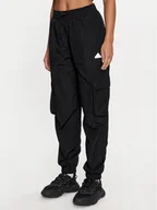 Spodnie sportowe damskie - adidas Spodnie dresowe City Escape IQ4826 Czarny Loose Fit - miniaturka - grafika 1
