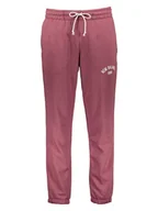 Spodnie sportowe męskie - New Balance Spodnie dresowe "Essentials Varsity" w kolorze różowym - miniaturka - grafika 1
