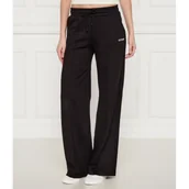Dresy damskie - GUESS ACTIVE Spodnie dresowe CARMEN | Loose fit - miniaturka - grafika 1