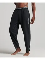 Spodnie sportowe męskie - Superdry Spodnie dresowe w kolorze ciemnoszarym - miniaturka - grafika 1