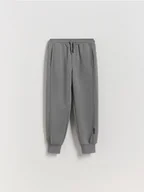 Spodnie i spodenki dla chłopców - Reserved - Dzianinowe joggery - ciemnoszary - miniaturka - grafika 1