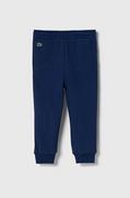 Spodnie i spodenki dla dziewczynek - Lacoste spodnie dresowe bawełniane dziecięce kolor niebieski z aplikacją - miniaturka - grafika 1