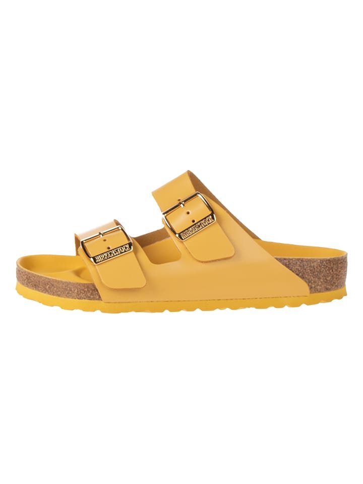 Birkenstock Skórzane klapki w kolorze żółtym