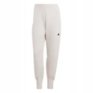 Dresy damskie - ADIDAS SPODNIE DAMSKIE Z.N.E. IS3937 r. XL - miniaturka - grafika 1