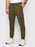 Spodnie sportowe męskie - Tommy Hilfiger Spodnie dresowe Tape MW0MW25073 Zielony Regular Fit - miniaturka - grafika 1